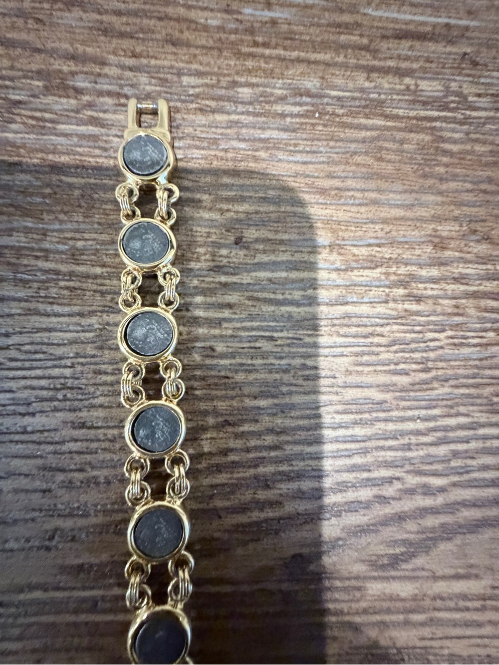 Gold-Tone Chain Bracelet with Black Stone Accents